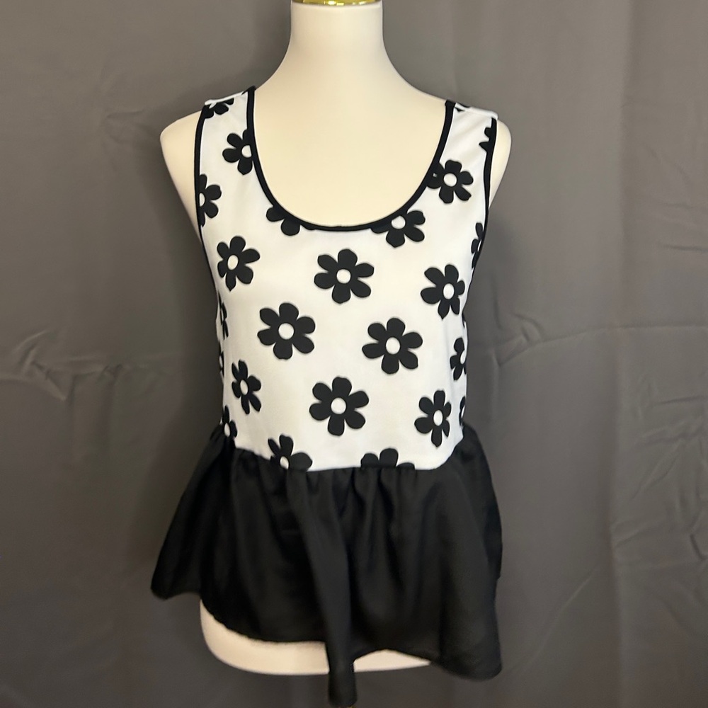 70s inspired peplum floral top with giant bow detailing on the back SOLD